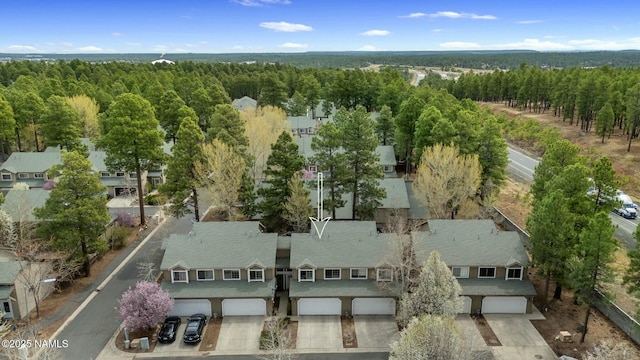 2548 S Gravel Ln, Flagstaff, AZ 86001 - drone / aerial view with a wooded view
