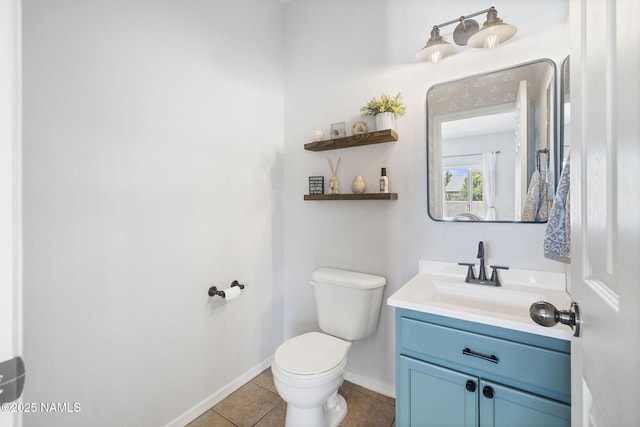 9119 W Arden Ln, Bellemont, AZ 86015 - bathroom featuring tile patterned floors, toilet, vanity, and baseboards