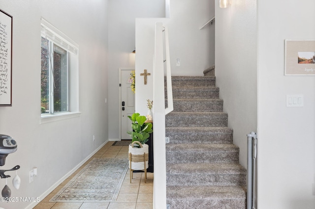 9119 W Arden Ln, Bellemont, AZ 86015 - stairs with baseboards and tile patterned flooring