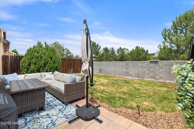 9119 W Arden Ln, Bellemont, AZ 86015 - view of yard with a fenced backyard, an outdoor living space, and a patio