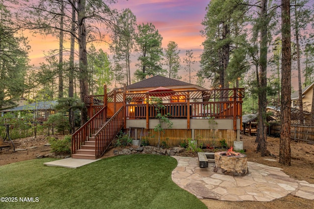 3480 S Moore Cir, Flagstaff, AZ 86005 - rear view of house with a fire pit, a deck, a patio, stairs, and a shingled roof