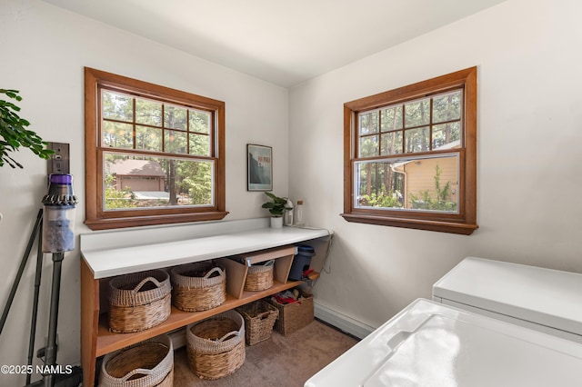 3480 S Moore Cir, Flagstaff, AZ 86005 - laundry room with healthy amount of natural light, baseboard heating, and carpet
