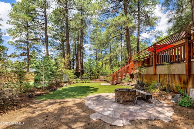 3480 S Moore Cir, Flagstaff, AZ 86005 - view of yard featuring a fire pit, stairs, a patio area, and a wooden deck