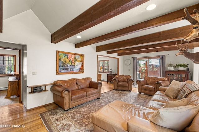 3480 S Moore Cir, Flagstaff, AZ 86005 - living room with wood finished floors, recessed lighting, a baseboard heating unit, and beamed ceiling