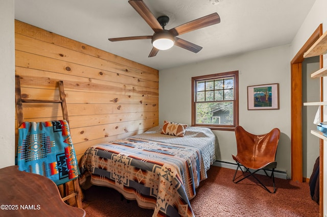 3480 S Moore Cir, Flagstaff, AZ 86005 - carpeted bedroom featuring a baseboard heating unit and a ceiling fan