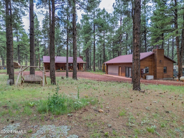 view of yard featuring a garage