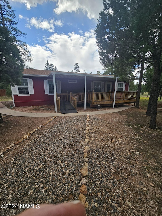 exterior space featuring a deck