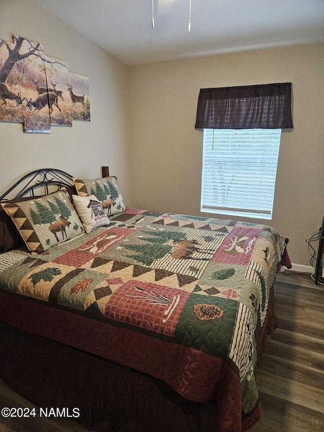 bedroom featuring hardwood / wood-style flooring