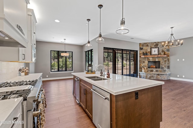 1031 Redwall Way, Williams, AZ 86046 - kitchen featuring dark wood-type flooring, open floor plan, a sink, and stainless steel appliances