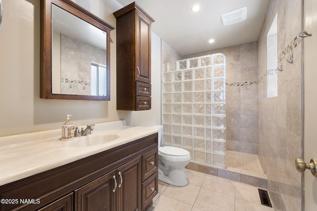 1707 N Fort Valley Rd, Flagstaff, AZ 86001 - bathroom with visible vents, walk in shower, toilet, vanity, and tile patterned floors