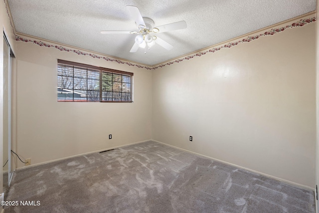 1707 N Fort Valley Rd, Flagstaff, AZ 86001 - carpeted spare room with a textured ceiling and a ceiling fan