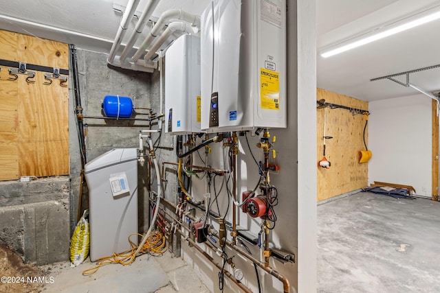 utility room featuring water heater