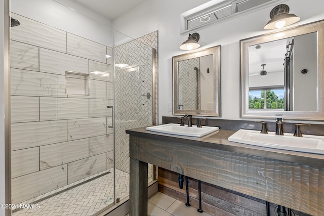 bathroom featuring tile patterned floors, walk in shower, and vanity