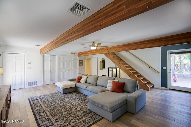 1750 E Mallory St, Mesa, AZ 85203 - living area with stairway, light wood-type flooring, ceiling fan, and beamed ceiling