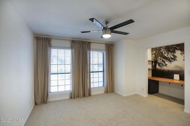 1750 E Mallory St, Mesa, AZ 85203 - spare room featuring ceiling fan, carpet floors, and built in study area