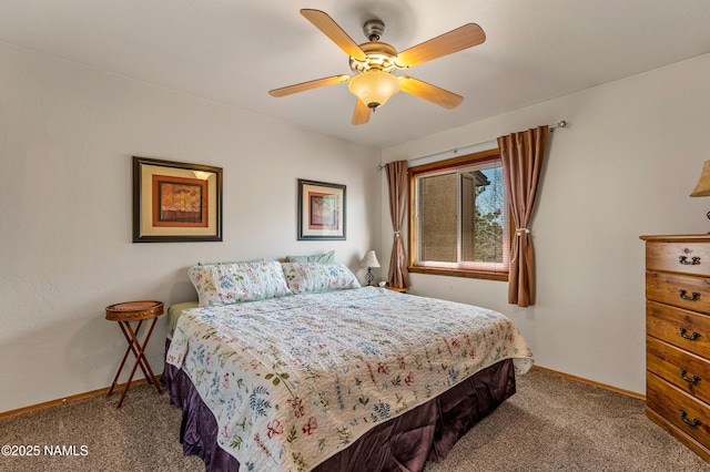 carpeted bedroom with baseboards and ceiling fan