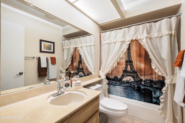 bathroom featuring tile patterned floors, toilet, and vanity