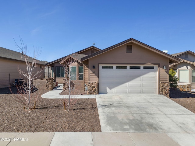 single story home featuring a garage