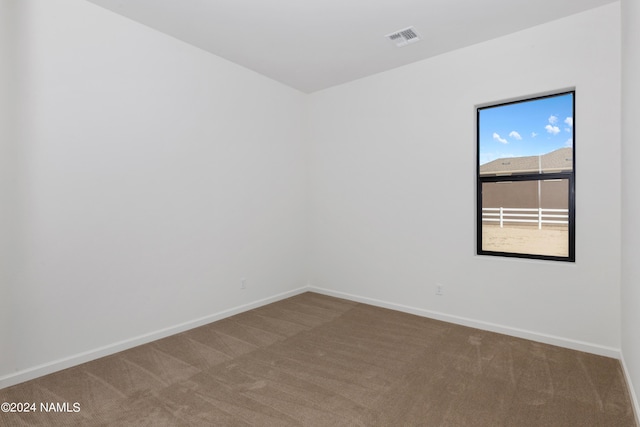 view of carpeted spare room