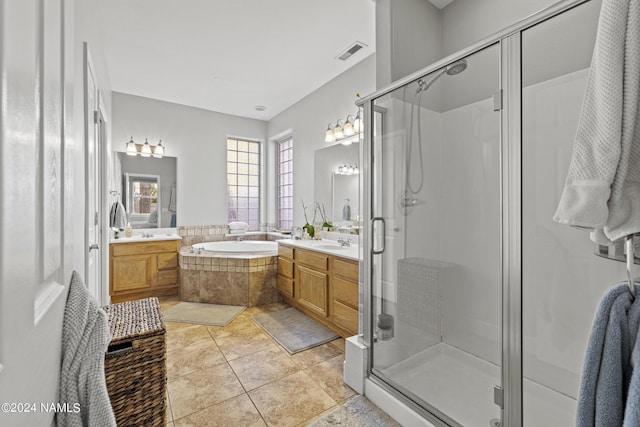 bathroom with vanity, separate shower and tub, and tile patterned flooring