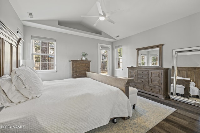 bedroom featuring ceiling fan, vaulted ceiling, and dark wood-type flooring