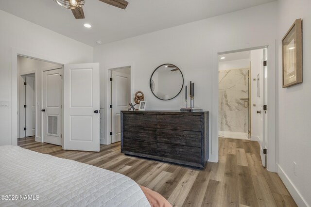 7939 N Red Lake Rd, Williams, AZ 86046 - bedroom featuring light wood-style floors, ensuite bath, and recessed lighting