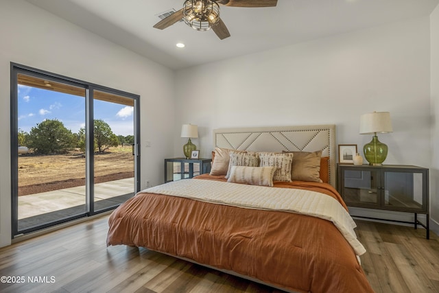 7939 N Red Lake Rd, Williams, AZ 86046 - bedroom with access to exterior, wood finished floors, recessed lighting, and ceiling fan