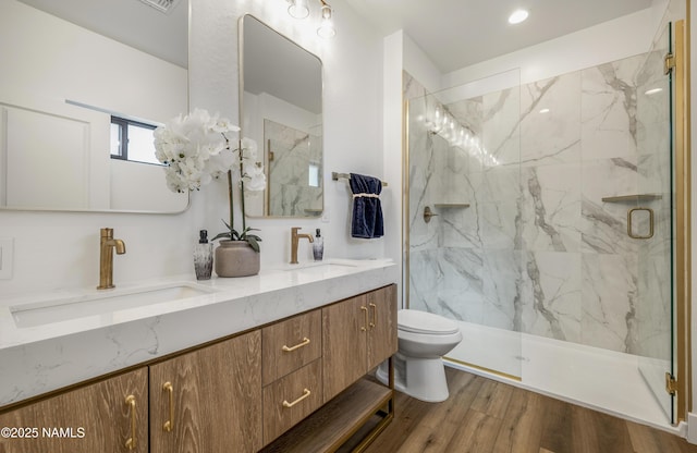 7939 N Red Lake Rd, Williams, AZ 86046 - full bath featuring a marble finish shower, double vanity, and wood finished floors