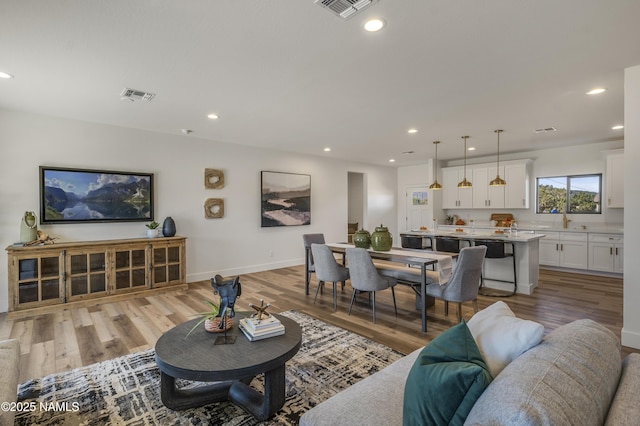 7939 N Red Lake Rd, Williams, AZ 86046 - living room with light wood finished floors and recessed lighting