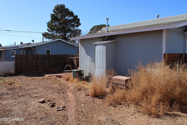 view of side of property featuring cooling unit