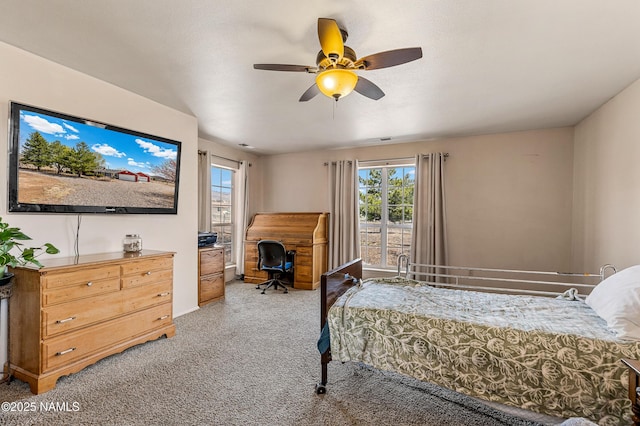 11095 N Rodeo Rd, Flagstaff, AZ 86004 - bedroom with visible vents, ceiling fan, and carpet