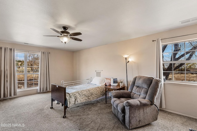 11095 N Rodeo Rd, Flagstaff, AZ 86004 - bedroom with carpet flooring, a ceiling fan, and visible vents
