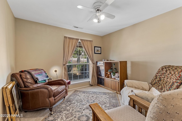 11095 N Rodeo Rd, Flagstaff, AZ 86004 - sitting room with visible vents, a ceiling fan, and carpet floors