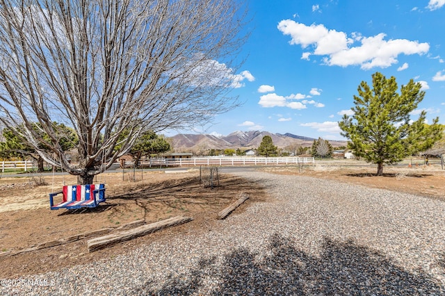 11095 N Rodeo Rd, Flagstaff, AZ 86004 - view of yard featuring a rural view, a mountain view, and fence