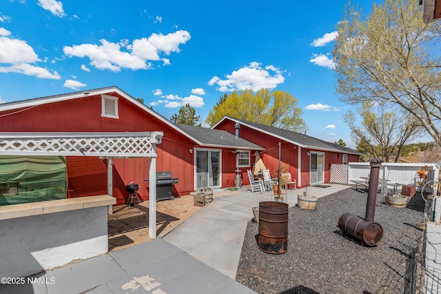 11095 N Rodeo Rd, Flagstaff, AZ 86004 - back of house with a patio