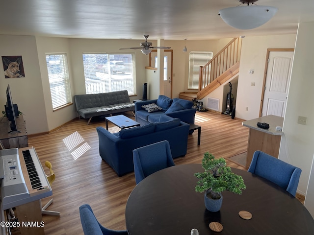 dining area with hardwood / wood-style floors