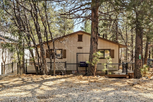 view of front of property featuring a wooden deck