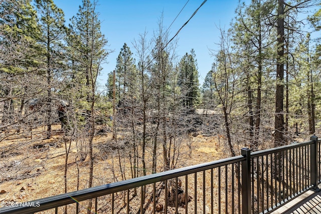 balcony with a forest view