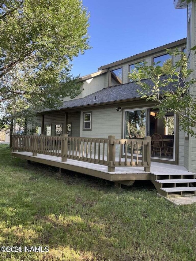8355 N Stony Mountain Way, Flagstaff, AZ 86001 - rear view of property featuring a deck and a lawn