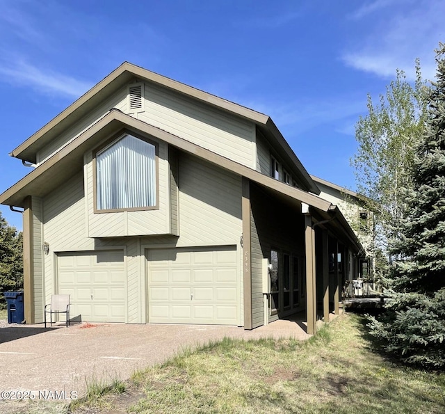 8355 N Stony Mountain Way, Flagstaff, AZ 86001 - view of home's exterior featuring a garage and driveway