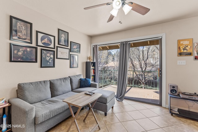 tiled living room featuring ceiling fan