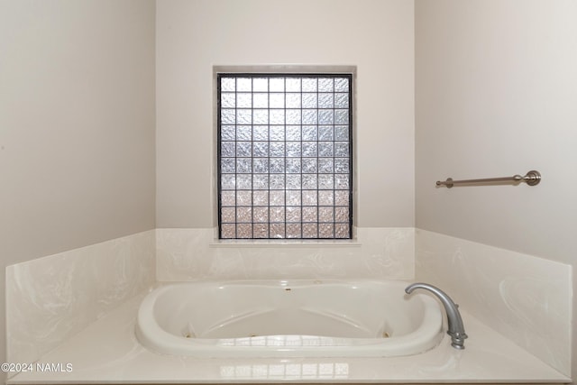 bathroom featuring a tub