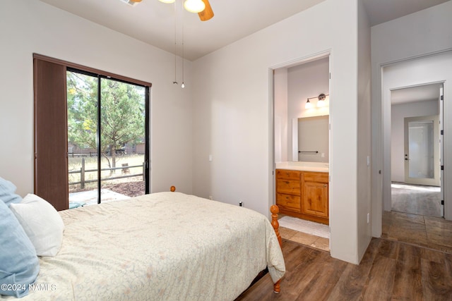 bedroom featuring ceiling fan, access to exterior, connected bathroom, and dark hardwood / wood-style flooring