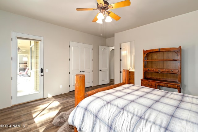 bedroom featuring a closet, dark wood-type flooring, connected bathroom, and ceiling fan