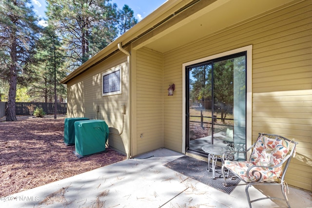 doorway to property featuring a patio