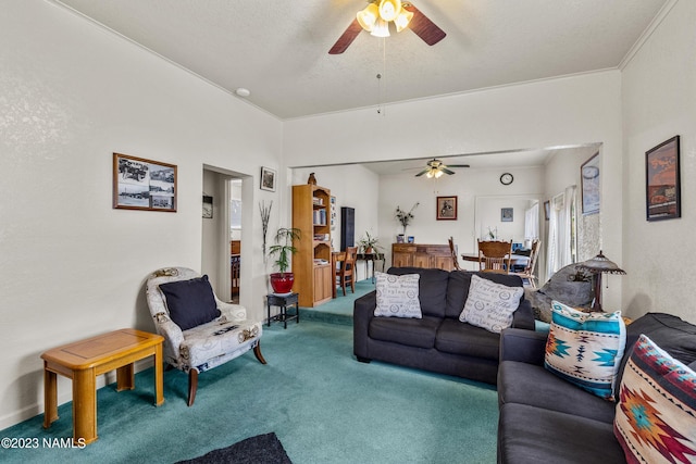 living room featuring carpet floors, ceiling fan, and a textured ceiling