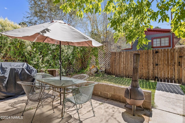 view of patio with a grill