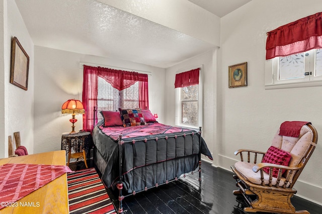 bedroom featuring dark hardwood / wood-style floors