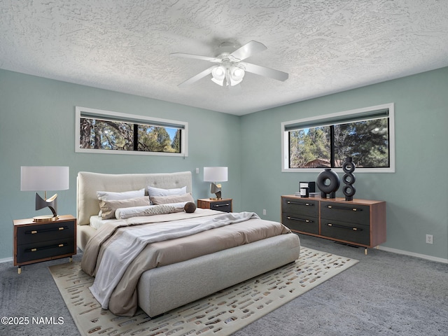 3792 E Ramble Wood Dr, Flagstaff, AZ 86004 - carpeted bedroom featuring a ceiling fan, baseboards, and a textured ceiling