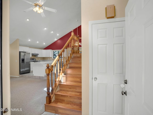 3792 E Ramble Wood Dr, Flagstaff, AZ 86004 - staircase featuring recessed lighting, lofted ceiling, and ceiling fan